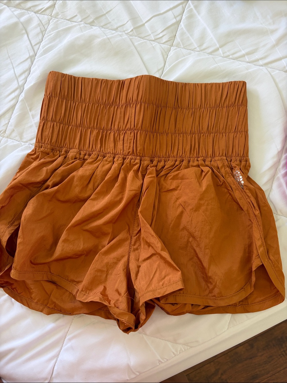 FP Movement by Free People High-Waist Smocked Shorts in Rust